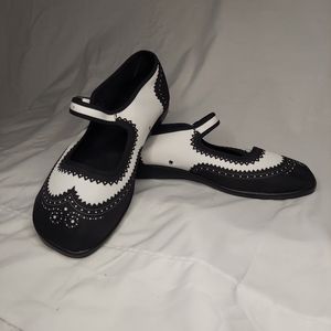 NWOT "Wingtip" black and white Mary Janes.